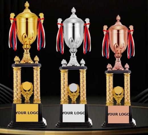 Gold, silver, and bronze championship cups